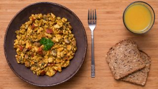 Vegan Spicy Scrambled Tofu with Mushrooms and Tomatoes, served with Multi-Grain Bread