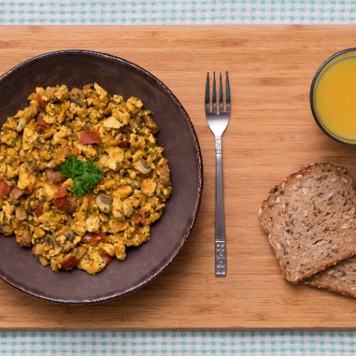 Vegan Spicy Scrambled Tofu with Mushrooms and Tomatoes, served with Multi-Grain Bread