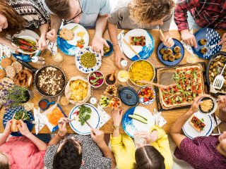 veganfoodone Group of people eating healthy food top view