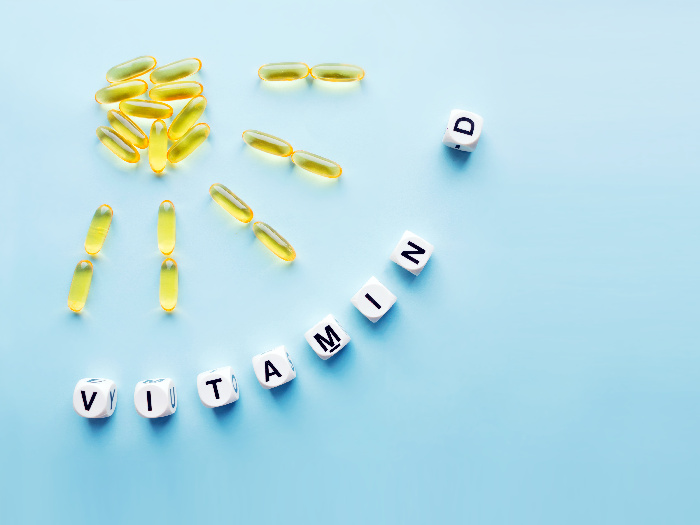 vitamin D supplement arranged in sun rays