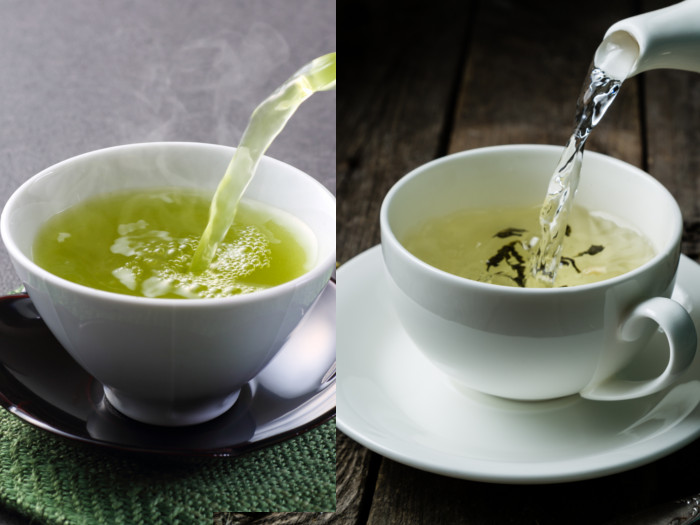 Pouring green tea and white tea in separate white cups with saucer