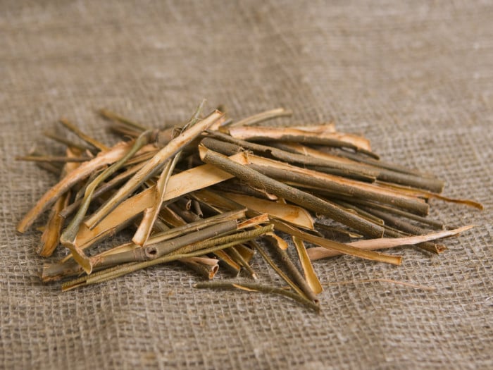 Close-up of dried willow bark on a jute cloth